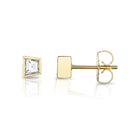 SINGLE STONE SLOANE STUDS | Earrings featuring 0.43ctw G/VS1 trapezoid cut diamonds bezel set in handcrafted 18K yellow gold stud earrings.