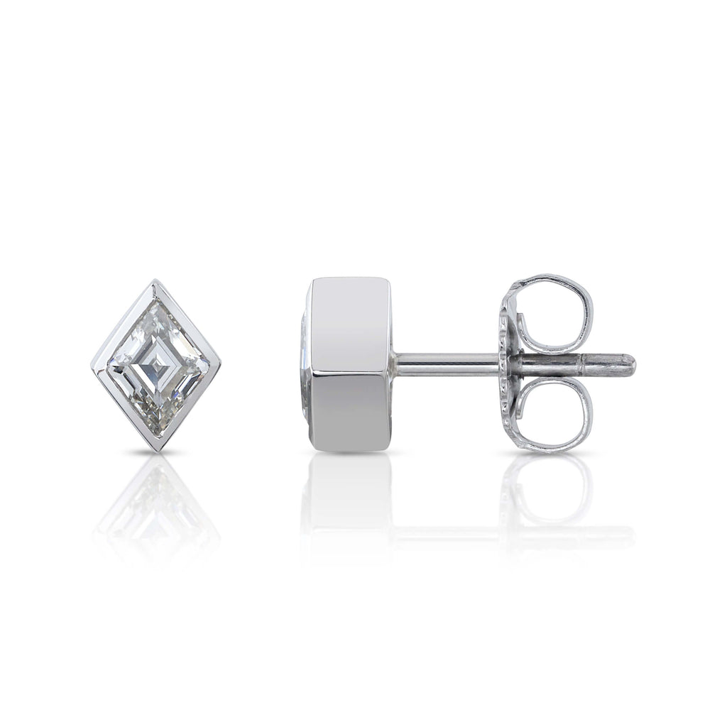 Single Stone's SLOANE STUDS earrings  featuring 0.61ctw H-I/VS1 lozenge cut diamonds bezel set in handcrafted platinum stud earrings.  
