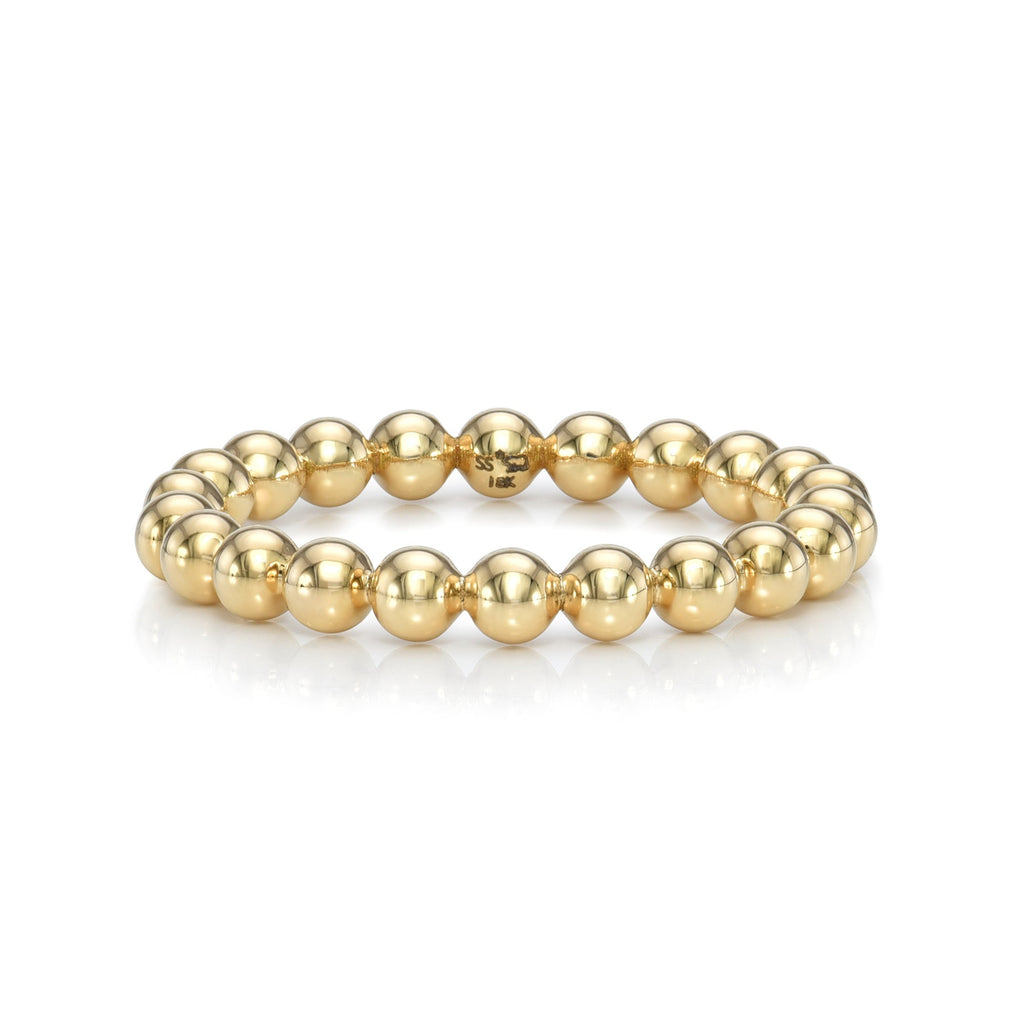 Single Stone's SMALL GAIA band  featuring 3mm handcrafted high polish 18K yellow gold beaded band.
