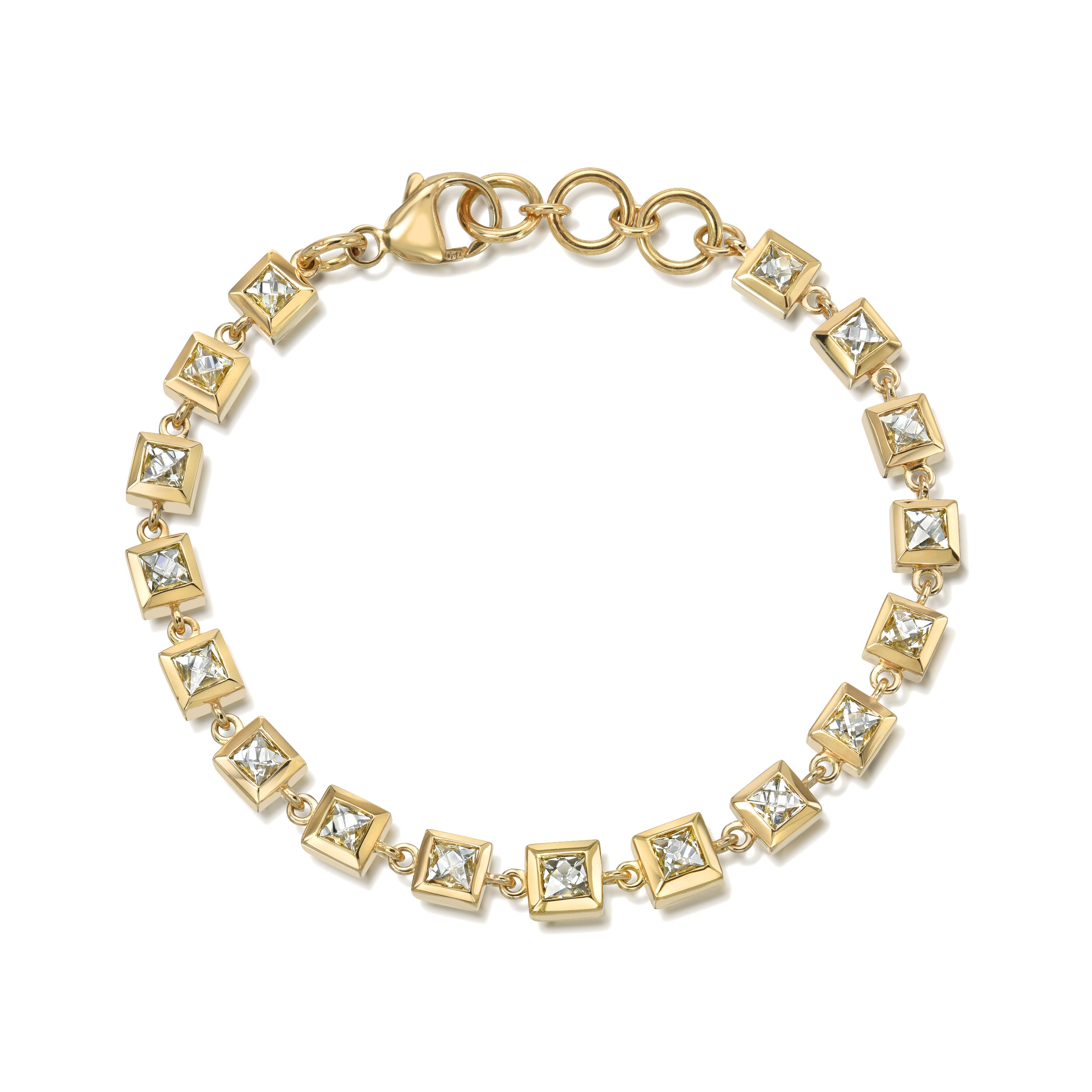 SINGLE STONE SMALL KARINA BRACELET featuring 5.45ctw J-K/VS-SI French cut diamonds bezel set on a handcrafted 18K yellow gold tennis bracelet. Bracelet measures 7.25".