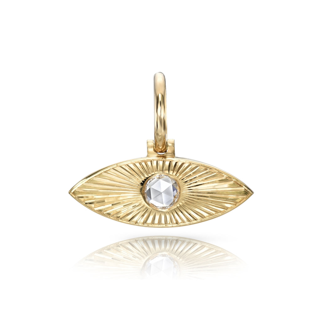 
Single Stone's Small naya pendant  featuring Approximately 0.15ct G-H/VS rose cut diamond bezel set in a handcrafted 18K yellow gold semi-oval shaped pendant.
Price does not include chain. 
