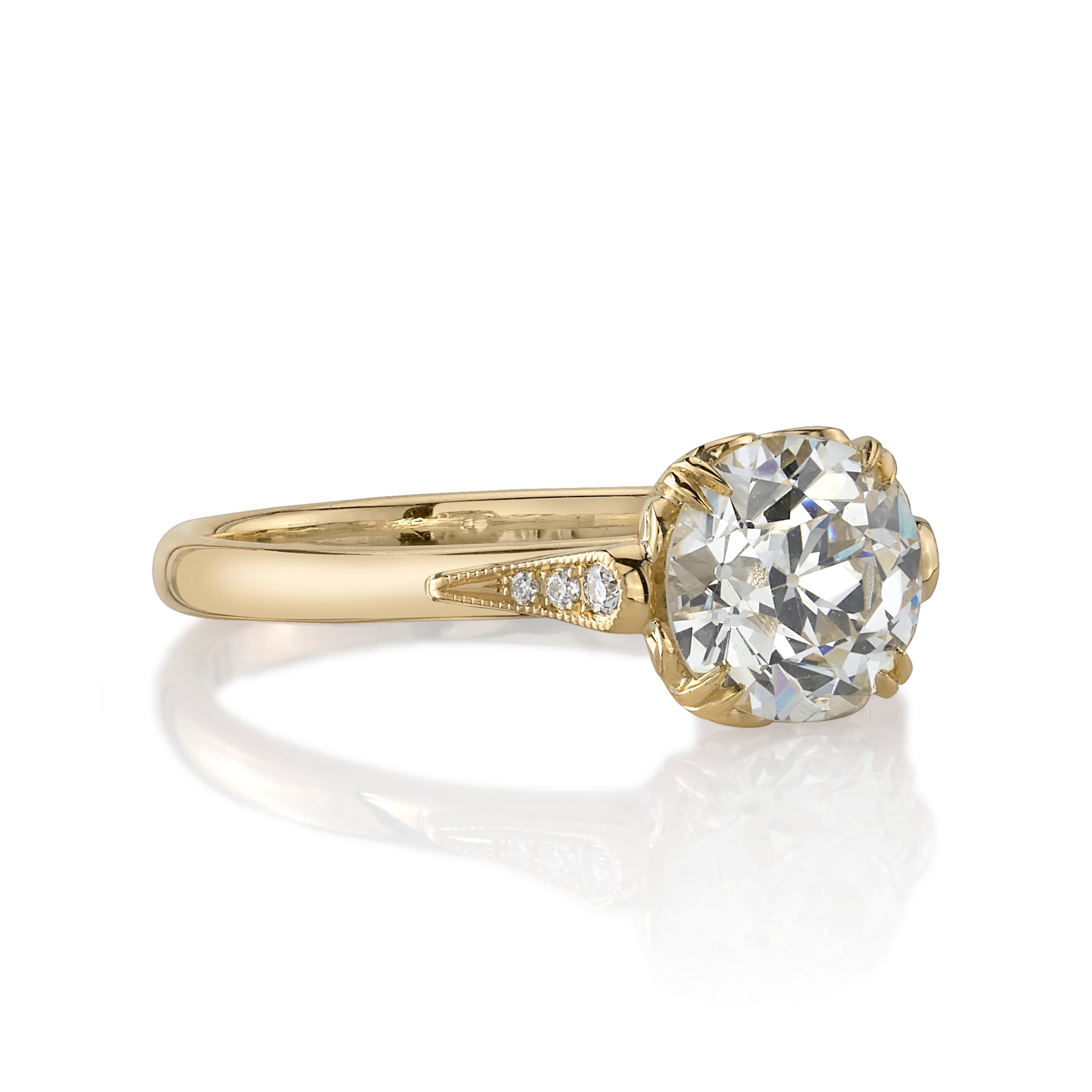 SINGLE STONE SYDNEE WITH DIAMONDS RING featuring 1.26ct N/VS1 GIA certified old European cut diamond with 0.03ctw old European cut accent diamonds set in a handcrafted 18K yellow gold mounting.