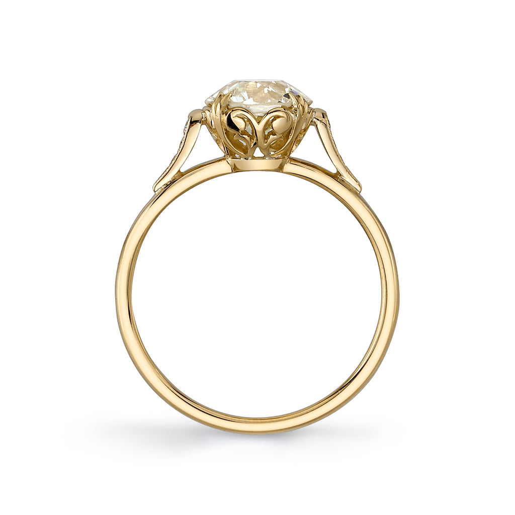 Single Stone's SYDNEE WITH DIAMONDS ring  featuring 1.26ct N/VS1 GIA certified old European cut diamond with 0.03ctw old European cut accent diamonds set in a handcrafted 18K yellow gold mounting.
