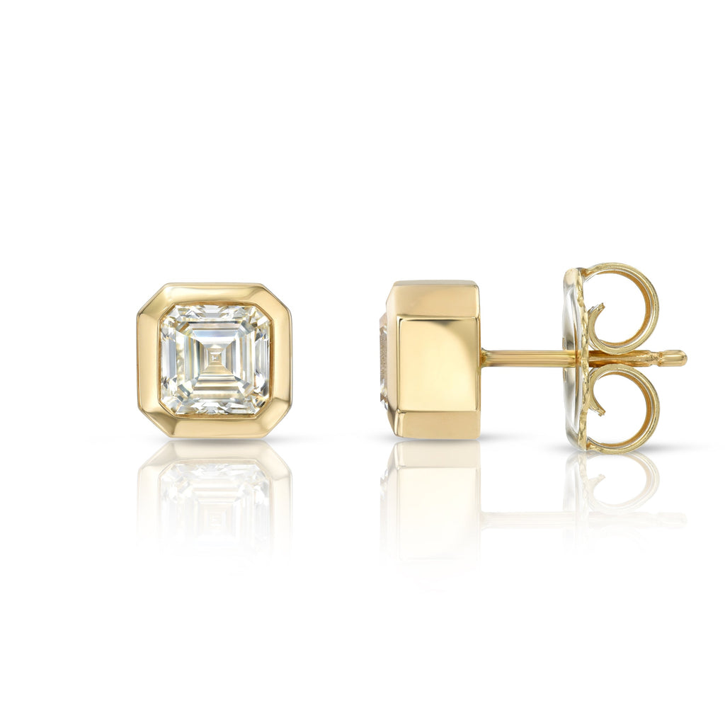 Single Stone's TEDDI STUDS earrings  featuring 2.06ctw L-M/VS1 GIA certified Asscher cut diamonds bezel set in handcrafted 18K yellow gold stud earrings.

