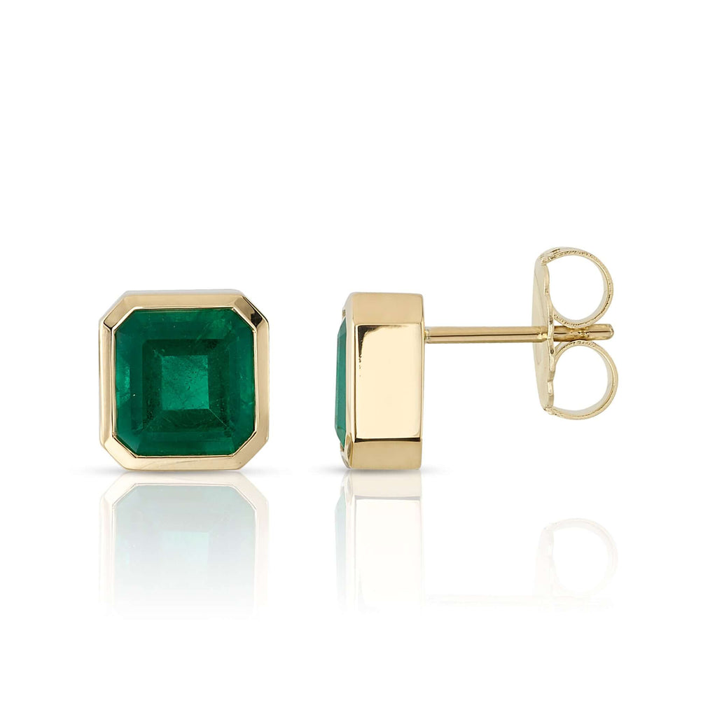 Single Stone's TEDDI STUDS earrings  featuring 4.65ctw GIA certified Asscher cut green emeralds bezel set in handcrafted 18K yellow gold stud earrings.

