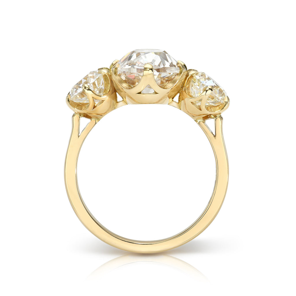 Single Stone's THREE STONE GIA ring  featuring 4.02ct S-T/VS2 GIA certified oval cut diamond with 1.73ctw J-L/VS1-SI1 GIA certified old European cut accent diamonds prong set in a handcrafted 18K yellow gold mounting.
