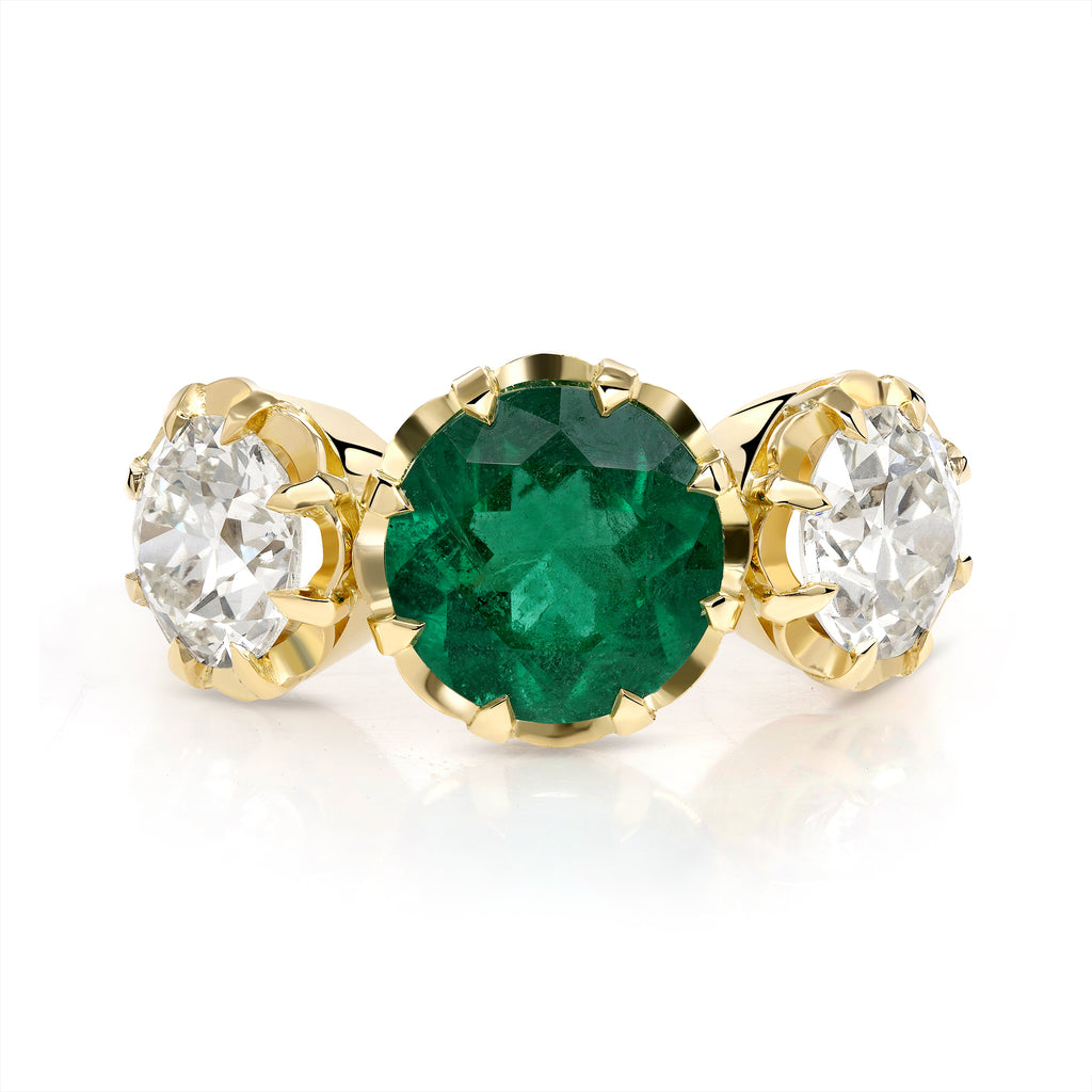 
Single Stone's Three stone jolene ring  featuring 2.19ct GIA certified natural Zambian old European cut green emerald with 2.27ctw M-N/VS1 old European cut accent diamonds prong set in a handcrafted 18K yellow gold mounting.


