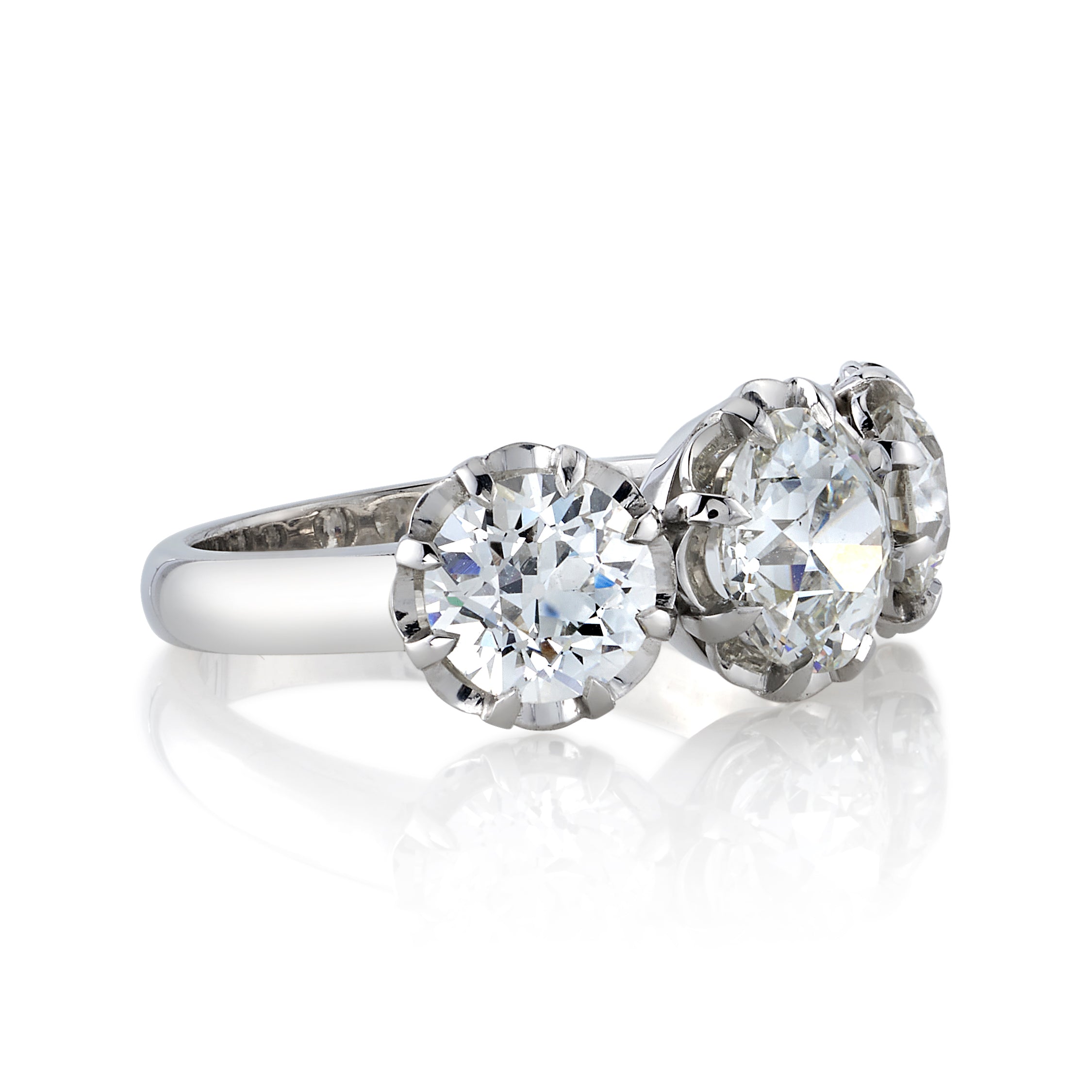SINGLE STONE THREE STONE JOLENE RING featuring 3.36ctw I-J/VS1-VS2 GIA certified old European cut diamonds set in a handcrafted platinum mounting.