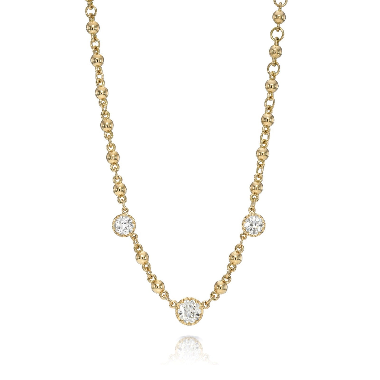 SINGLE STONE THREE STONE ROSALINA NECKLACE featuring 1.61ctw J,K,M-VS-SI2 old mine cut diamonds prong set in a handcrafted 18K yellow gold necklace.