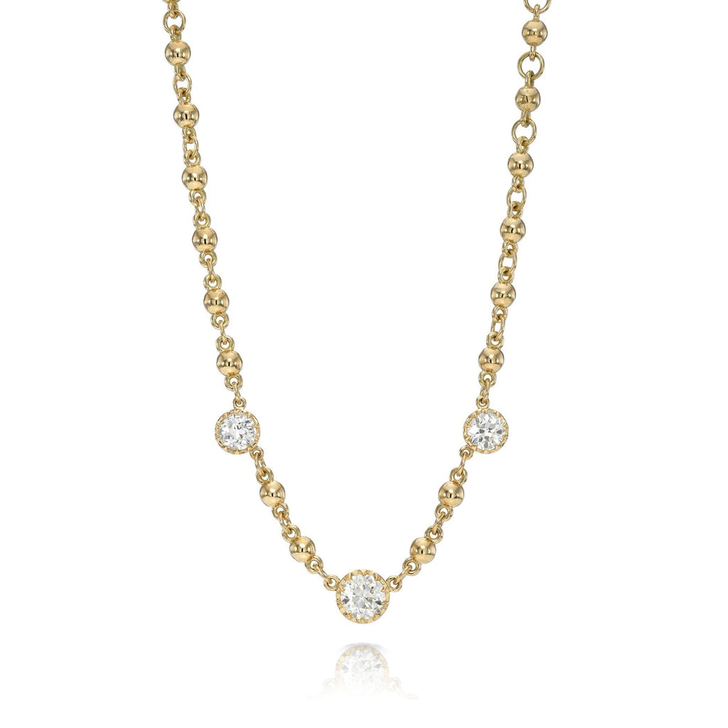 
Single Stone's Three stone rosalina necklace ring  featuring 1.61ctw J,K,M-VS-SI2 old mine cut diamonds prong set in a handcrafted 18K yellow gold necklace.
Necklace measures 17".
