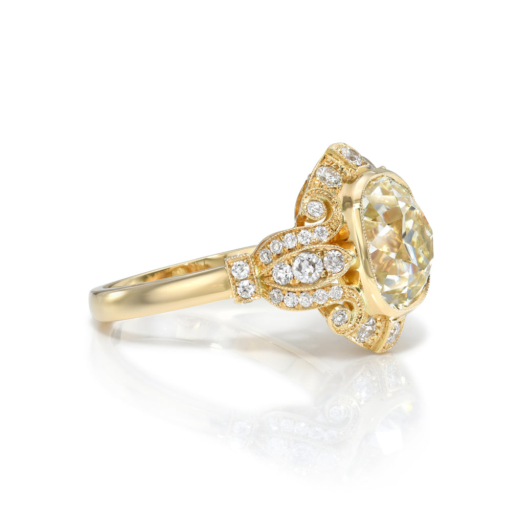 Single Stone's TIFFANY ring  featuring 3.36ct O-P/SI1 antique cushion cut diamond with 0.46ctw old European cut accent diamonds set in a handcrafted 18K yellow gold mounting.
