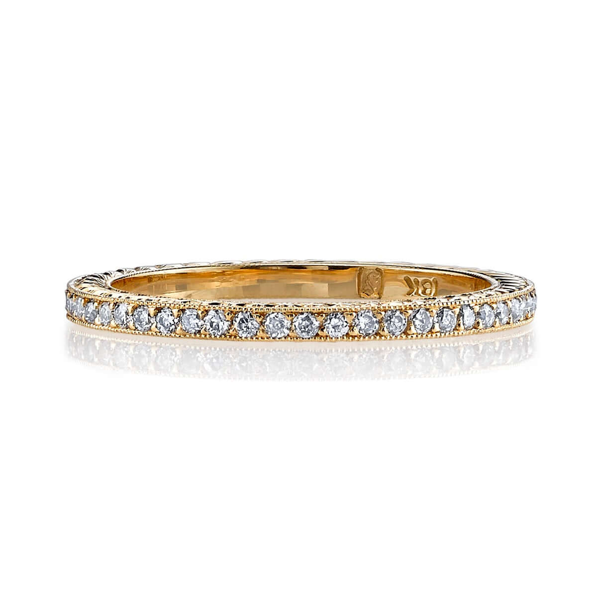 SINGLE STONE MOLLY BAND | Approximately 0.40ctw G-H/VS old European cut diamonds set in an handcrafted eternity band featuring engraved sidewalls. Approximate band with 1.6mm. Please inquire for additional customization.