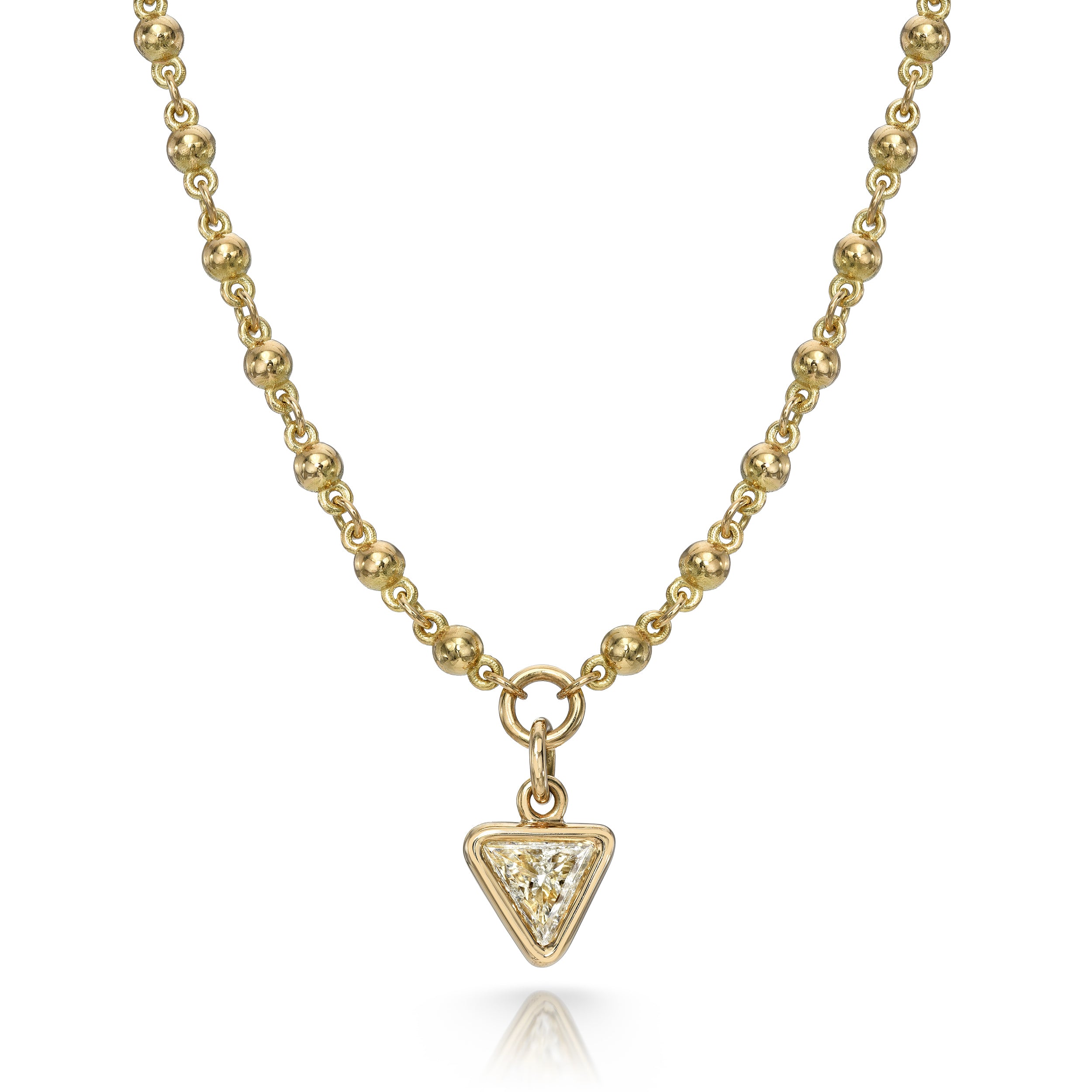 SINGLE STONE VEDA featuring 1.05ct H/SI1 trillion cut diamond bezel set on a handcrafted 18K yellow gold pendant necklace. Necklace measures 17".