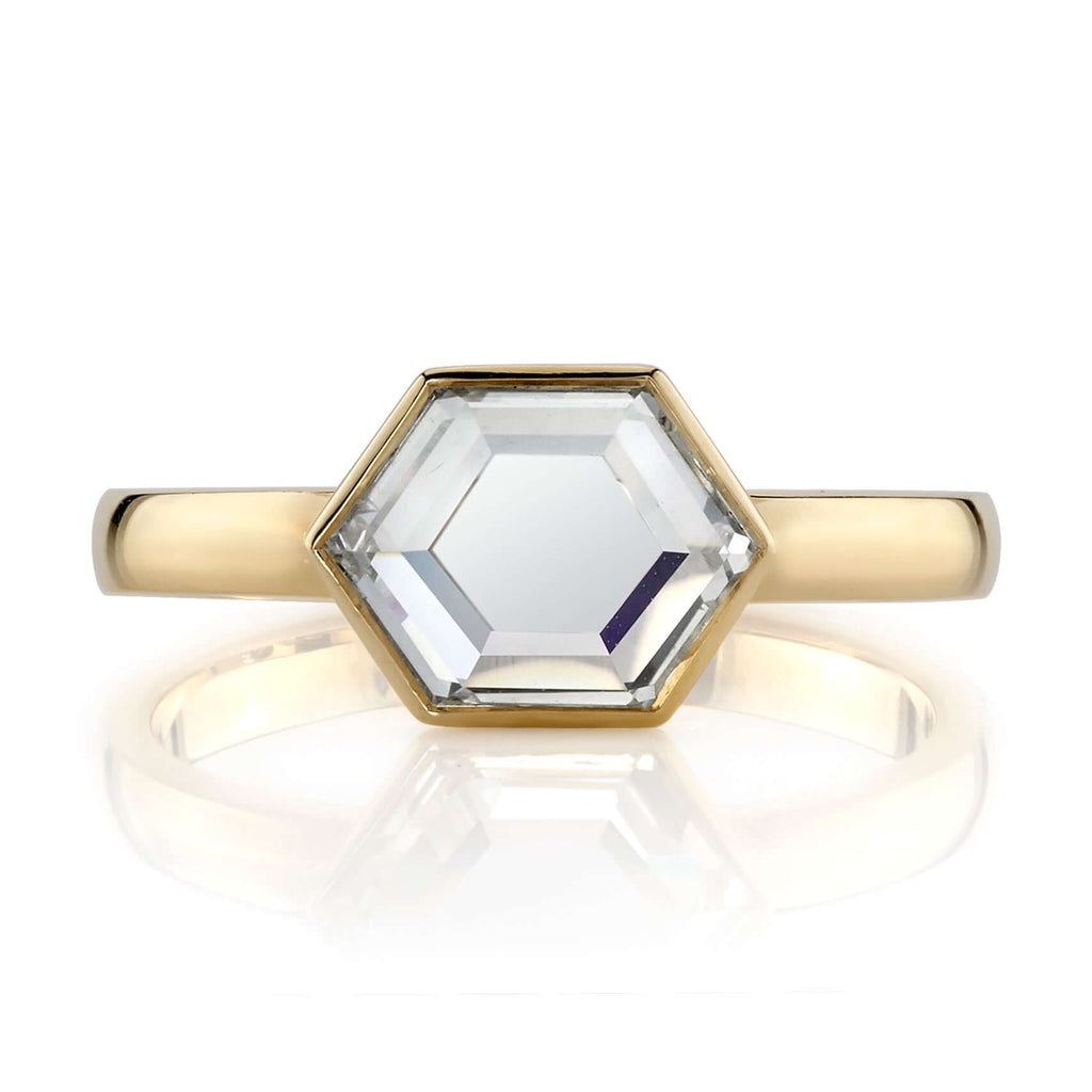 Single Stone's WYLER ring  featuring 1.47ct K/VS2 GIA certified hexagonal portrait cut diamond set in a handcrafted 18K yellow gold mounting.
