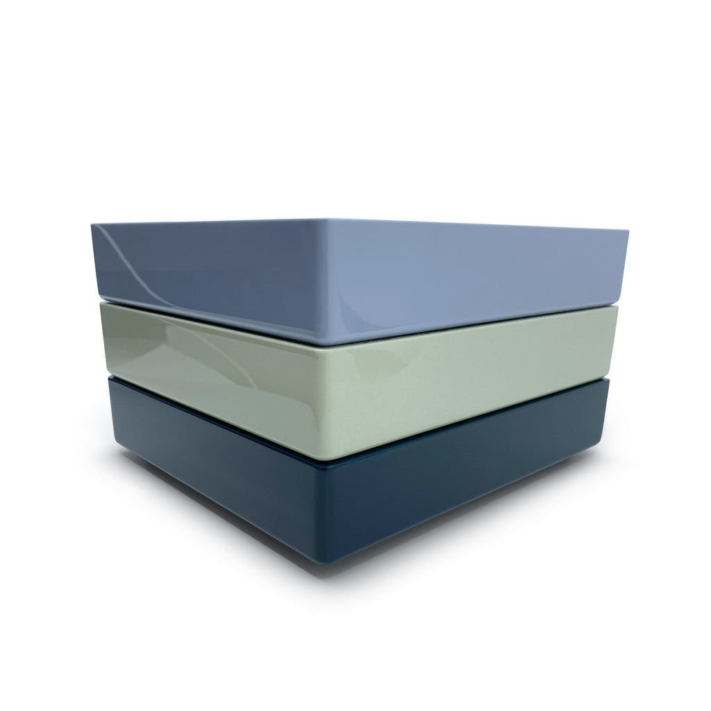 Single Stone's SMALL STACKING JEWELRY TRAY - EVENING BLUE  featuring Color: Dusty blue with deep indigo interior Wood with high lacquer finish Features delicate gold effect inlay 19cm long, 22cm wide, 4.4cm high
